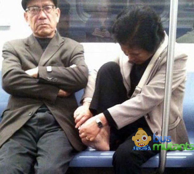 Lady gives herself a pedicure on the bus.